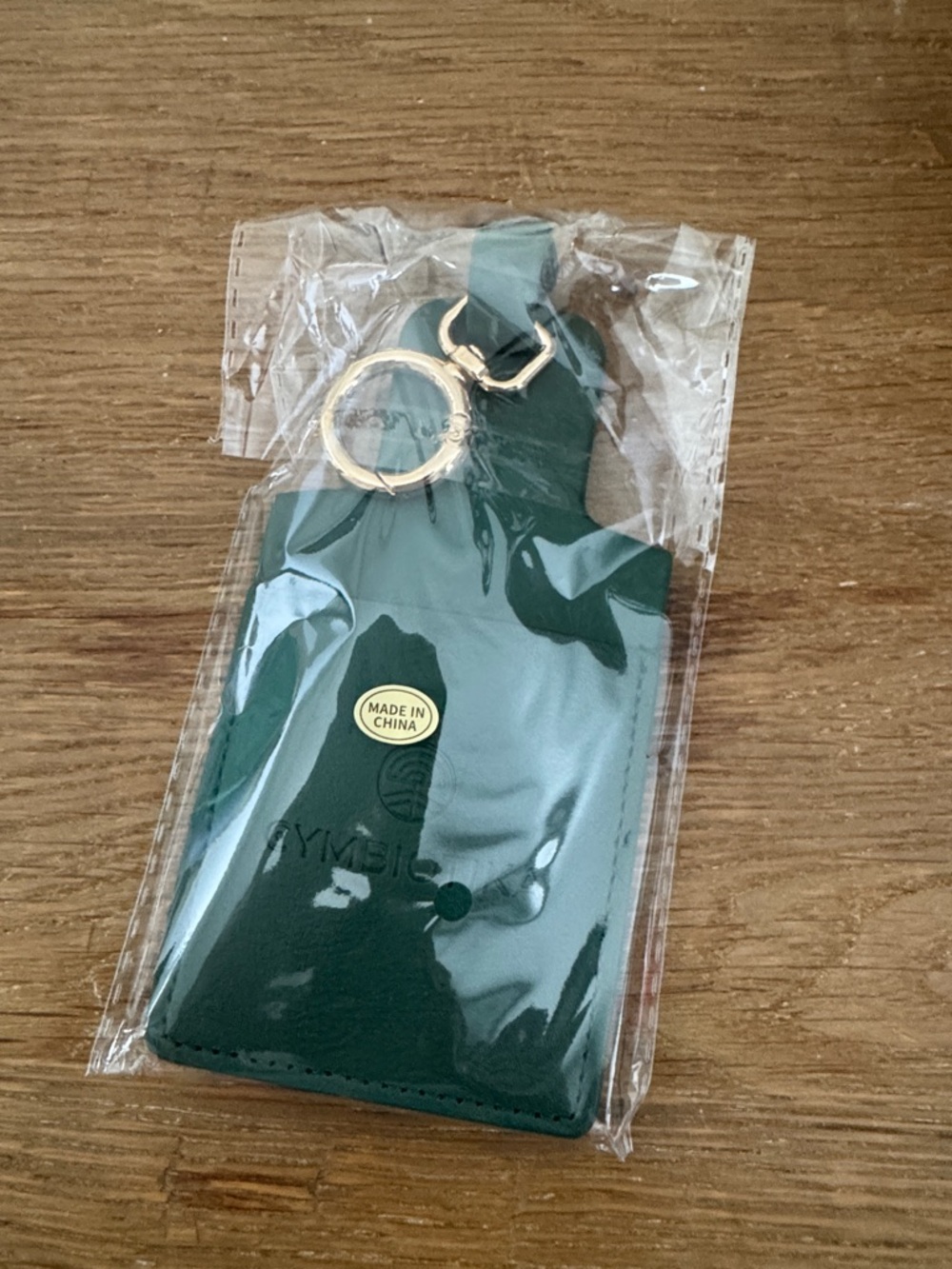 Green Leather Card or packet Holder Keychain with Gold Ring